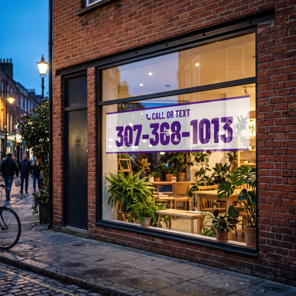 (307) 368-1013 on a shop window