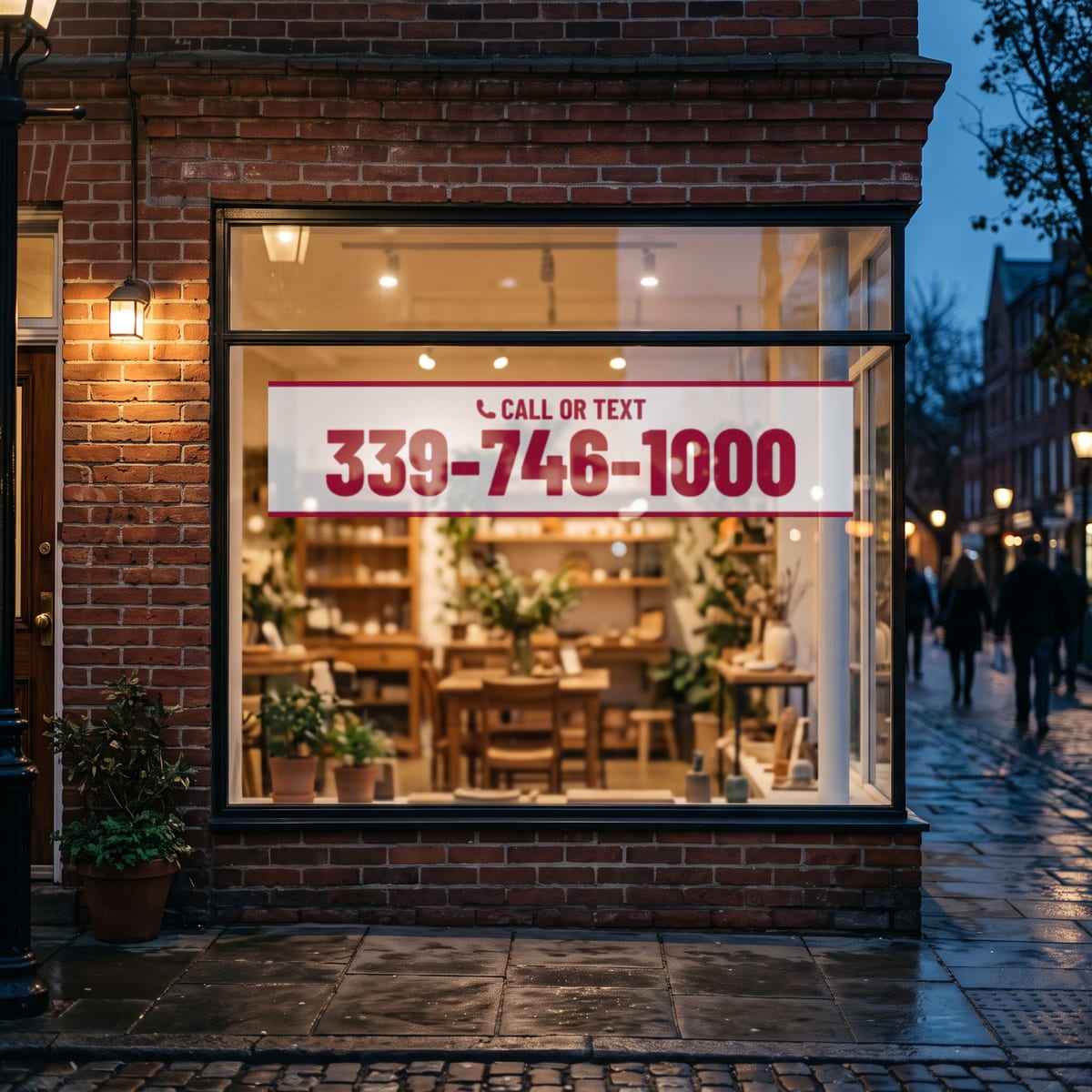 (339) 746-1000 on a shop window
