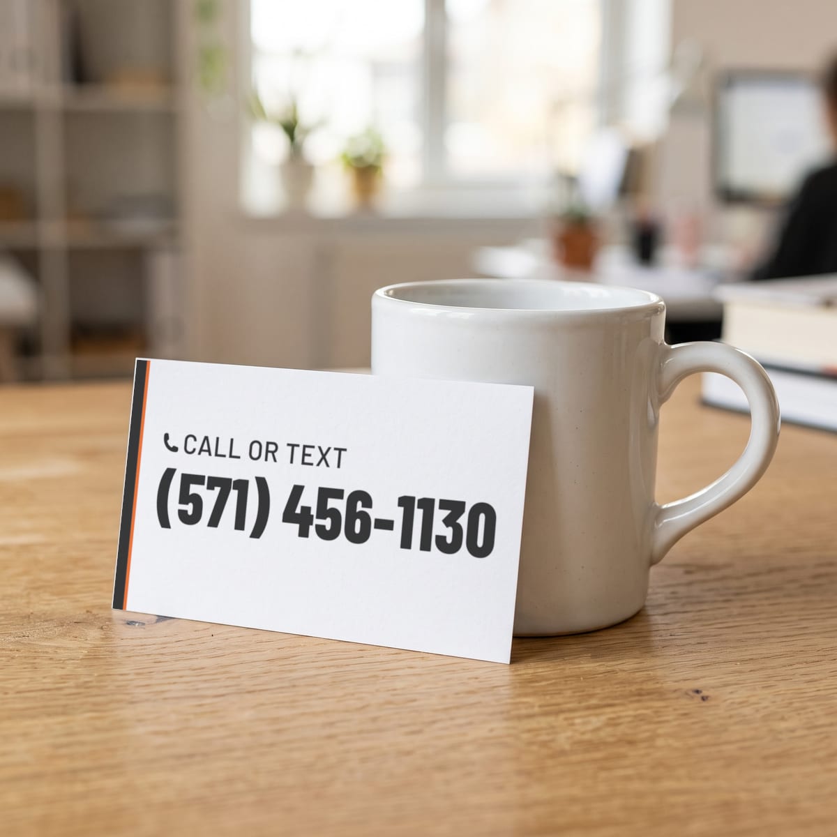 (571) 456-1130 on a business card
