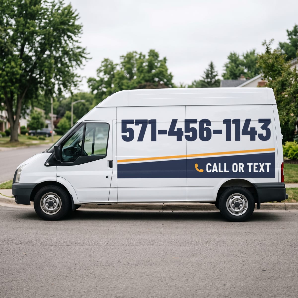 (571) 456-1143 painted on a work van