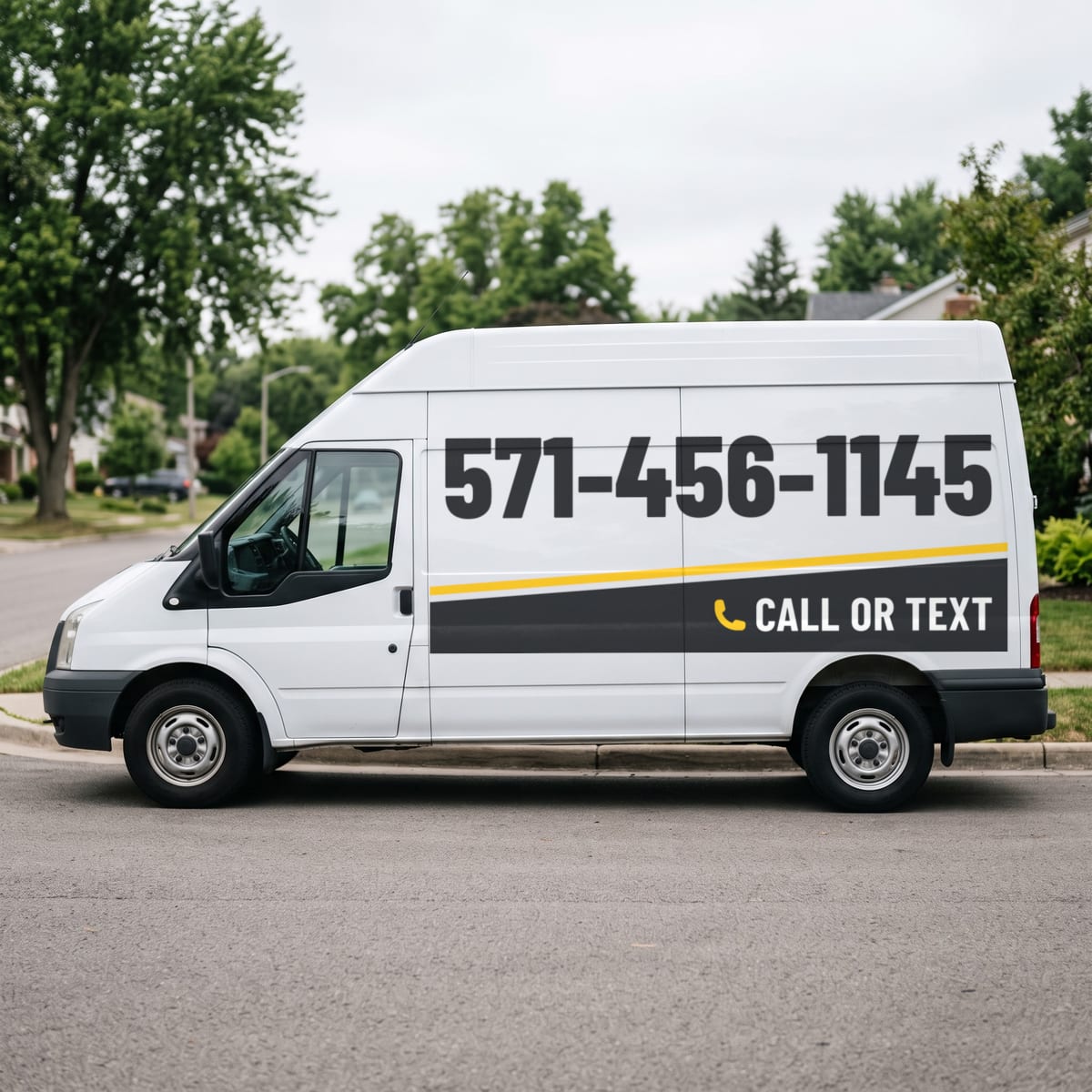 (571) 456-1145 painted on a work van