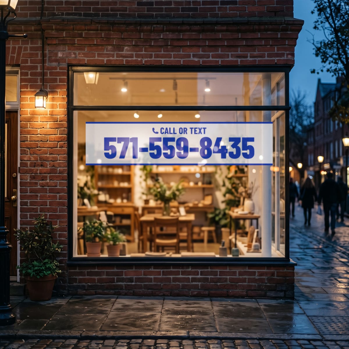 (571) 559-8435 on a shop window