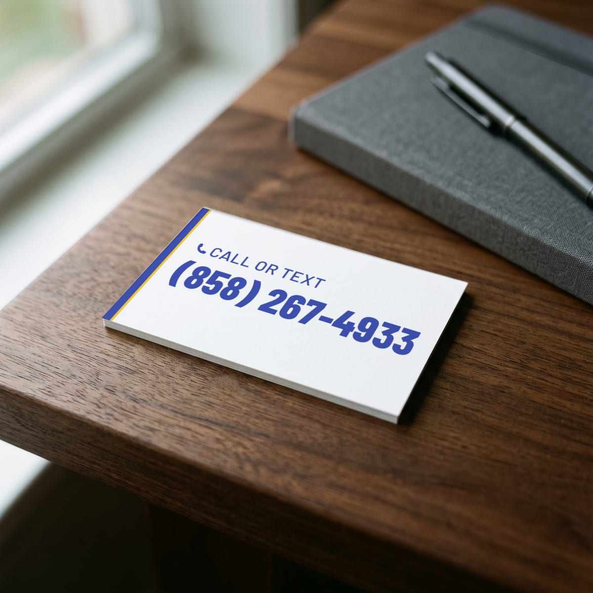 (858) 267-4933 on a business card
