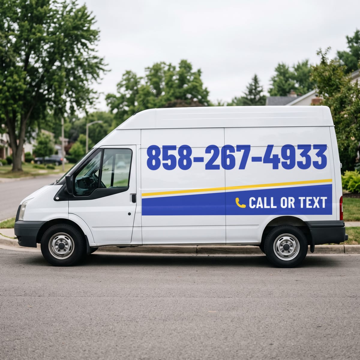 (858) 267-4933 painted on a work van