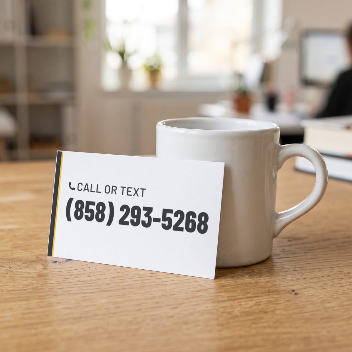 (858) 293-5268 on a business card